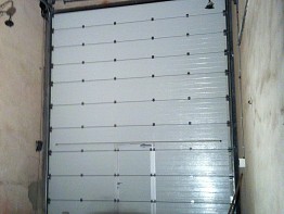 Промышленные секционные подъемные ворота